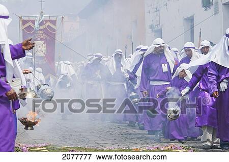 Men And Boys Wear Purple As A Sign Of Mourning At The Procession Of The Holy Cross On Good Friday In Antigua Guatemala, Sacatep View Large Photo Image Stock Photo - Men And Boys Wear Purple As A Sign Of Mourning At The Procession Of The Holy Cross On Good Friday In Antigua Guatemala, Sacatep. Fotosearch