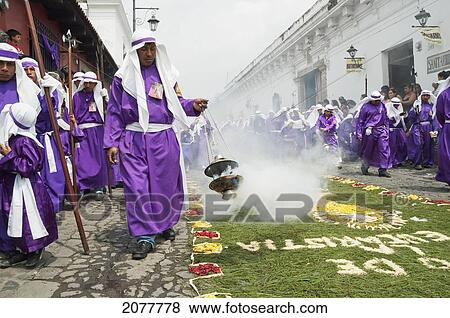 Men And Boys Wear Purple As A Sign Of Mourning At The Procession Of The Holy Cross On Good Friday In Antigua Guatemala, Sacatep View Large Photo Image Stock Photo - Men And Boys Wear Purple As A Sign Of Mourning At The Procession Of The Holy Cross On Good Friday In Antigua Guatemala, Sacatep. Fotosearch