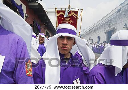 Men And Boys Wear Purple As A Sign Of Mourning At The Procession Of The Holy Cross On Good Friday In Antigua Guatemala, Sacatep View Large Photo Image Stock Photo - Men And Boys Wear Purple As A Sign Of Mourning At The Procession Of The Holy Cross On Good Friday In Antigua Guatemala, Sacatep. Fotosearch