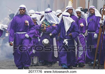 Stock Photograph - Men And Boys Wear Purple As A Sign Of Mourning At The Procession Of The Holy Cross On Good Friday In Antigua Guatemala, Sacatep. Fotosearch