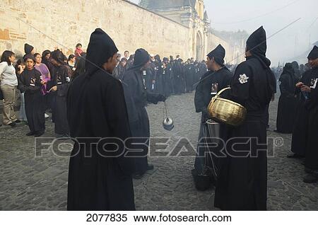 Men & Boys Dressed In Mourning At The Holy Burial Procession On Good Friday In Antigua Guatemala, Sacatep View Large Photo Image Stock Photography - Men & Boys Dressed In Mourning At The Holy Burial Procession On Good Friday In Antigua Guatemala, Sacatep. Fotosearch