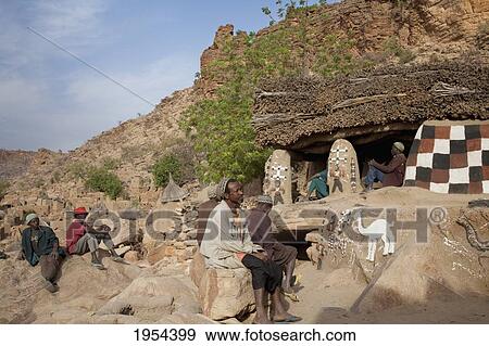Stock Photo - Men by the Toguna (House of words) in Tireli, Mali. Fotosearch