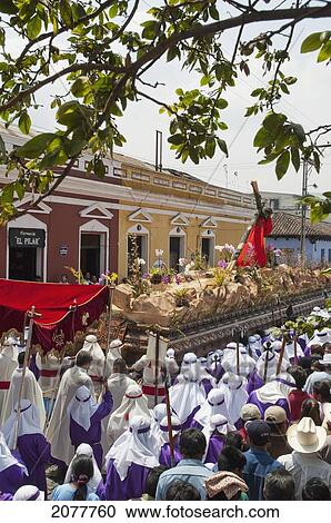 Stock Image - Men Carrying The Anda (Float) Of Jesus Carrying The Cross During The Procession Of The Holy Cross On Good Friday In Antigua Guatemala, Sacatep. Fotosearch