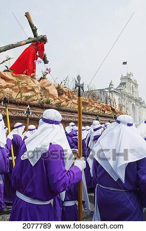 Men Carrying The Anda (Float) Of Jesus Carrying The Cross During The Procession Of The Holy Cross On Good Friday In Antigua Guatemala, Sacatep View Large Photo Image Stock Photo - Men Carrying The Anda (Float) Of Jesus Carrying The Cross During The Procession Of The Holy Cross On Good Friday In Antigua Guatemala, Sacatep. Fotosearch