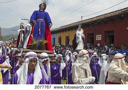 Stock Photo - Men Carrying The Andas (Floats) Of A Saint & The Virgin Mary At The Procession Of The Holy Cross On Good Friday In Antigua Guatemala, Sacatep. Fotosearch