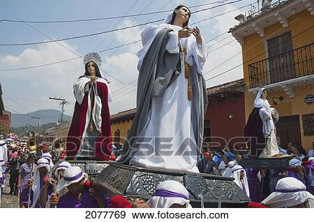Stock Photo - Men Carrying The Andas (Floats) Of The Virgin Mary At The Procession Of The Holy Cross On Good Friday In Antigua Guatemala, Sacatep. Fotosearch