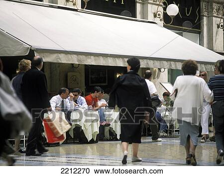 Men Chatting In Cafe In Galleria Vittorio Emanuele Ii, Milan, Italy. View Large Photo Image Stock Image - Men Chatting In Cafe In Galleria Vittorio Emanuele Ii, Milan, Italy.. Fotosearch