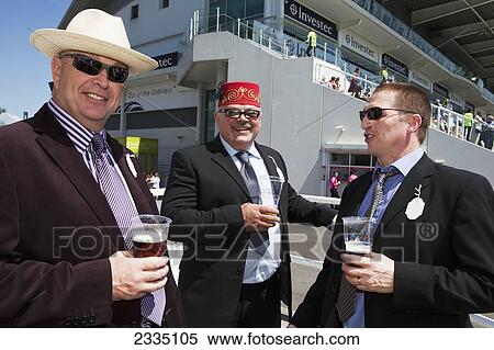 Men Enjoying Beer On Sunny Day At Epsom Derby; London, England, Uk View Large Photo Image Stock Photography - Men Enjoying Beer On Sunny Day At Epsom Derby; London, England, Uk. Fotosearch