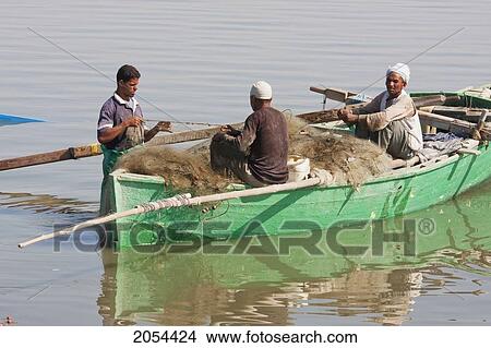 Picture - Men Fishing From A Boat, Lake Qarun, El Fayoum, Egypt. Fotosearch