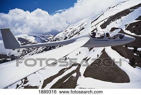 Men Gliding Over Pyrenees View Large Photo Image Stock Photograph - Men Gliding Over Pyrenees. Fotosearch