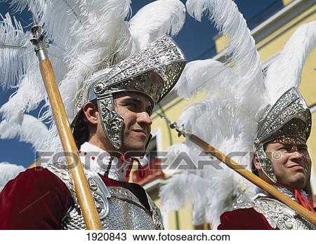 Men In Roman Soldier Costumes In Semana Santa Parade Through Seville, Andalucia, Spain View Large Photo Image Stock Image - Men In Roman Soldier Costumes In Semana Santa Parade Through Seville, Andalucia, Spain. Fotosearch