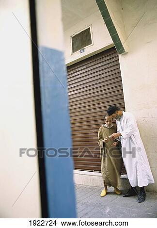 Picture - Men In Street Tangiers. Fotosearch