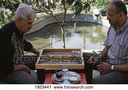Men Playing Backgammon. View Large Photo Image Stock Image - Men Playing Backgammon.. Fotosearch