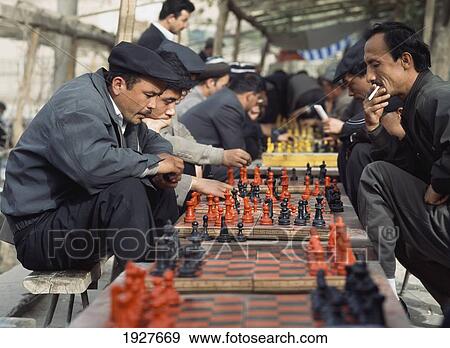 Stock Photo - Men Playing Chess. Fotosearch