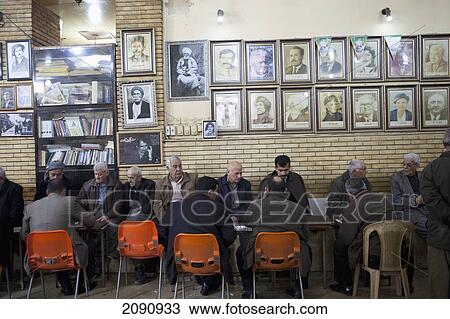 Stock Image - Men Playing Dominoes And Backgammon In The Sha'ab Chai Khana [Teahouse], Sulaymaniyah, Iraqi Kurdistan, Iraq. Fotosearch