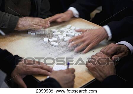 Stock Photography - Men Playing Dominoes In The Sha'ab Chai Khana [Teahouse], Sulaymaniyah, Iraqi Kurdistan, Iraq. Fotosearch