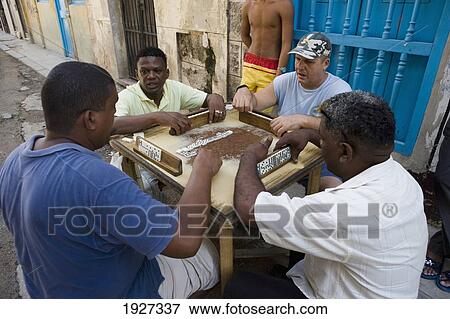 Men Playing Dominoes On Table In Street View Large Photo Image Stock Photo - Men Playing Dominoes On Table In Street. Fotosearch