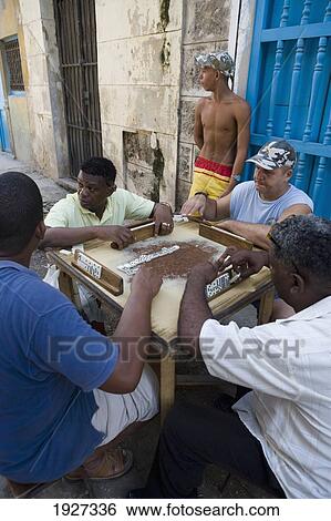 Men Playing Dominoes On Table In Street View Large Photo Image Stock Photograph - Men Playing Dominoes On Table In Street. Fotosearch