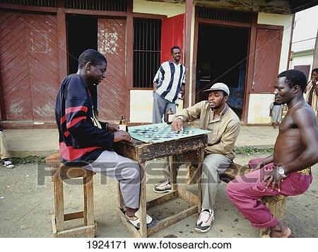 Stock Image - Men Playing Draughts In Street. Fotosearch