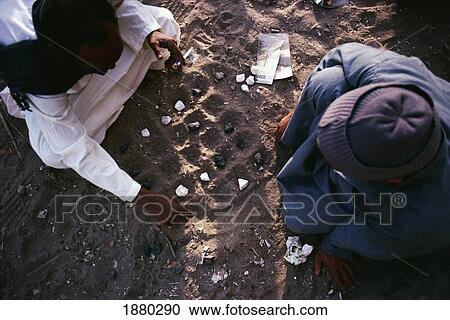 Stock Image - Men Playing Egyptian Draught Game Seega. Fotosearch