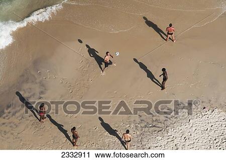 Men Playing Soccer On Ipanema Beach; Rio De Janeiro, Brazil View Large Photo Image Stock Image - Men Playing Soccer On Ipanema Beach; Rio De Janeiro, Brazil. Fotosearch