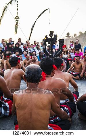 Men sitting in a circle chanting in trance during a Kecak dance performance, Ulu Watu, Bali, Indonesia View Large Photo Image Stock Image - Men sitting in a circle chanting in trance during a Kecak dance performance, Ulu Watu, Bali, Indonesia. Fotosearch