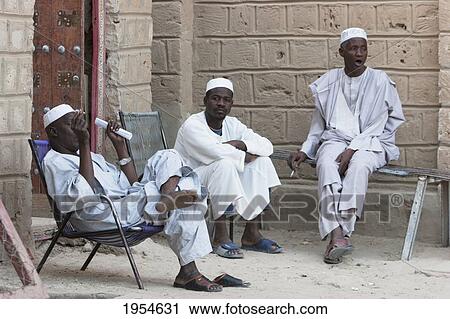 Men sitting together in Timbuktu, Mali View Large Photo Image Stock Image - Men sitting together in Timbuktu, Mali. Fotosearch