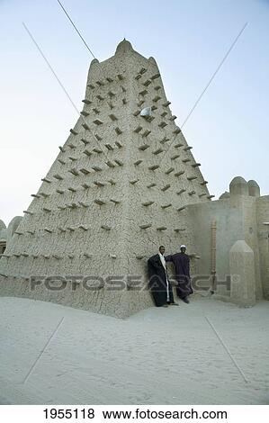 Stock Photo - Men Standing Near Sankore Mosque, Timbuktu, Mali. Fotosearch