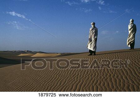Men Standing On Sand Dunes View Large Photo Image Stock Photography - Men Standing On Sand Dunes. Fotosearch