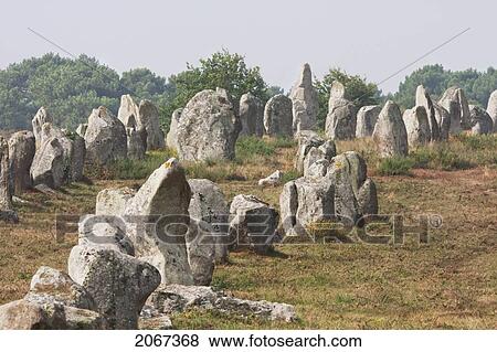 Menhirs In The Kermario Alignments, Carnac, Morbihan, France View Large Photo Image Stock Photo - Menhirs In The Kermario Alignments, Carnac, Morbihan, France. Fotosearch