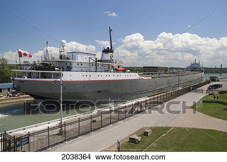 Merchant Ship Going Through A Lock; St. Catharines Ontario Canada View Large Photo Image Picture - Merchant Ship Going Through A Lock; St. Catharines Ontario Canada. Fotosearch