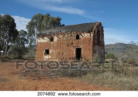 Stock Image - Merina House Along The Road Between Ambositra & Ambavalao, Fianarantsoa Province, Madagascar. Fotosearch