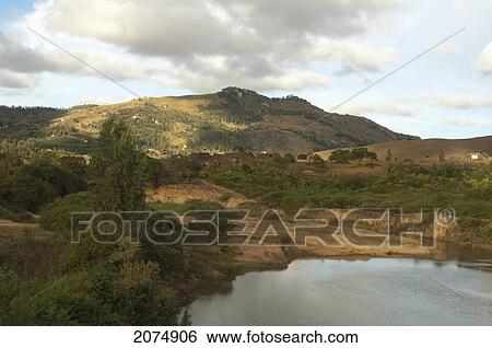 Merina Village And Rice Fields Along The Road Between Ambositra & Ambavalao, Fianarantsoa Province, Madagascar View Large Photo Image Stock Photograph - Merina Village And Rice Fields Along The Road Between Ambositra & Ambavalao, Fianarantsoa Province, Madagascar. Fotosearch