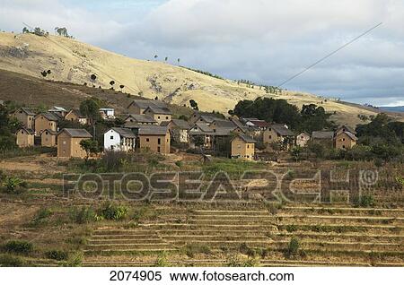 Stock Photography - Merina Village And Rice Fields Along The Road Between Ambositra & Ambavalao, Fianarantsoa Province, Madagascar. Fotosearch