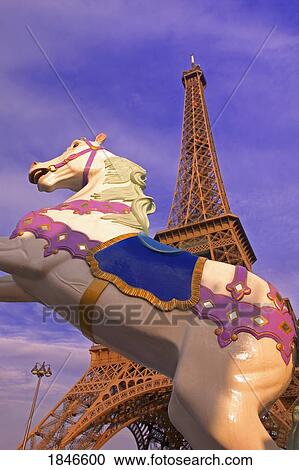 Stock Image - Merry-Go-Round And Eiffel Tower; Paris, France. Fotosearch