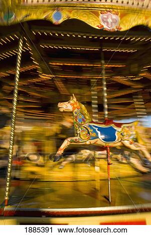 Stock Image - Merry Go Round, Blurred Motion. Fotosearch