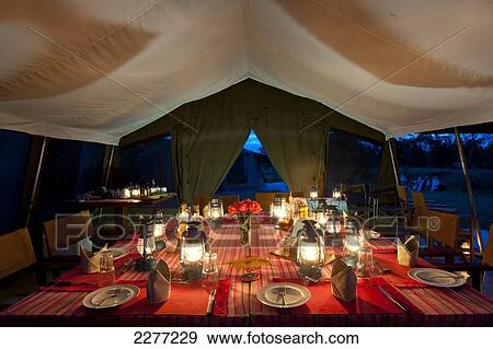 Stock Photo - Mess tent at dusk, Ol Pejenta Bush Camp, Ol Pejeta Conservancy; Kenya. Fotosearch