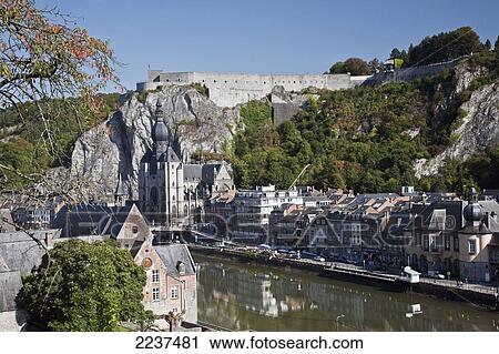 Stock Image - Meuse River Citadel And Cathedral; Dinant Namur Belgium. Fotosearch