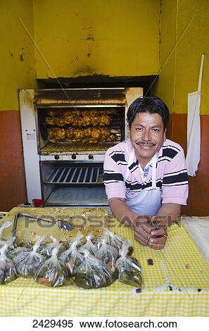 Mexican man in his barbeque chicken shop; Guanajuato, Mexico View Large Photo Image Stock Photography - Mexican man in his barbeque chicken shop; Guanajuato, Mexico. Fotosearch
