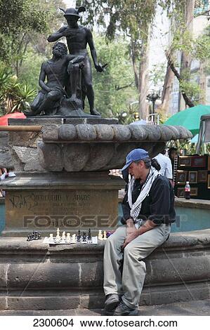 Picture - Mexico, Chess Player And Fountain On Avenida Alvaro Obregon In Fashionable Colonia Roma District; Mexico City. Fotosearch