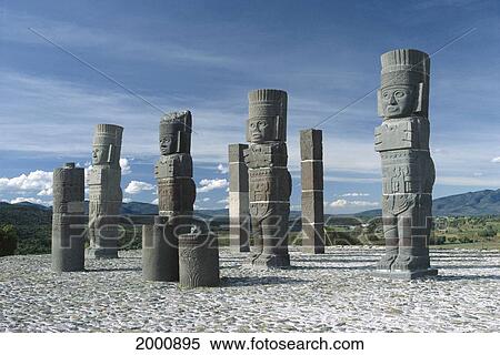 Stock Photography - Mexico, Close-Up Of Tula Stone Sculptures, Remote Area, Blue Sky, Clouds. Fotosearch