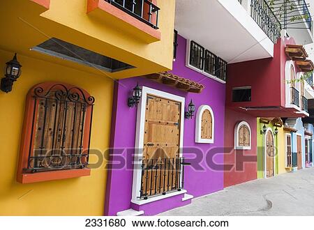Mexico, Colorful exterior with wood windows and doors typical in Mexico; Puerto Vallarta View Large Photo Image Stock Image - Mexico, Colorful exterior with wood windows and doors typical in Mexico; Puerto Vallarta. Fotosearch