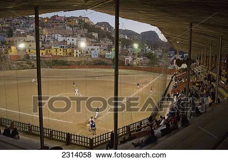 Stock Photo - Mexico, Guanajuato, Guanajuato, Baseball match in suburbs area. Fotosearch