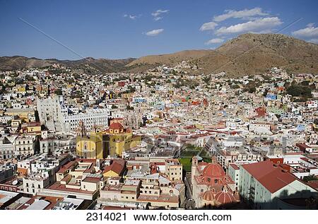 Stock Image - Mexico, Guanajuato, Guanajuato, View of colorful buildings in downtown. Fotosearch
