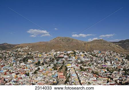 Stock Image - Mexico, Guanajuato, Guanajuato, View of colorful buildings in downtown. Fotosearch