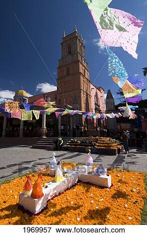 Stock Photo - Mexico, Guanajuato, San Miguel De Allende, Plaza Principal, Decorations For The Day Of The Dead Festival, Iglesia De San Rafael (Background).. Fotosearch