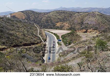 Mexico, Guanajuato State, Guanajuato, Highway at entrance of Guanajuato surrounded by mountains View Large Photo Image Picture - Mexico, Guanajuato State, Guanajuato, Highway at entrance of Guanajuato surrounded by mountains. Fotosearch