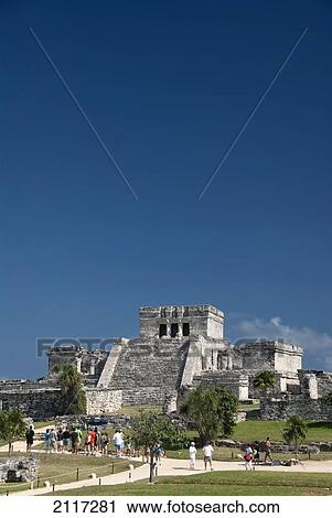 Mexico, Quintana Roo, Tulum, the Mayan ruins of Tulum, El Castillo (the Castle), tourists enjoying the view View Large Photo Image Stock Image - Mexico, Quintana Roo, Tulum, the Mayan ruins of Tulum, El Castillo (the Castle), tourists enjoying the view. Fotosearch