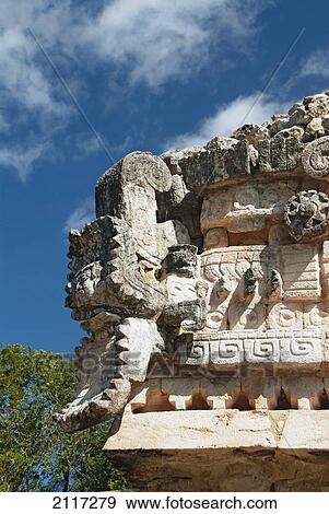 Mexico, Yucatan, Labna, El Paclacio (the Palace), the well known stone carved serpents mouth with a human head peering out between the jaws View Large Photo Image Stock Photo - Mexico, Yucatan, Labna, El Paclacio (the Palace), the well known stone carved serpents mouth with a human head peering out between the jaws. Fotosearch