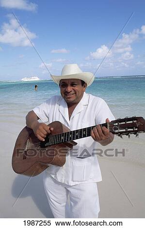 Mexico, Yucatan Peninsula, Mariachi Guitar Player on beach; Costa Maya View Large Photo Image Stock Photography - Mexico, Yucatan Peninsula, Mariachi Guitar Player on beach; Costa Maya. Fotosearch